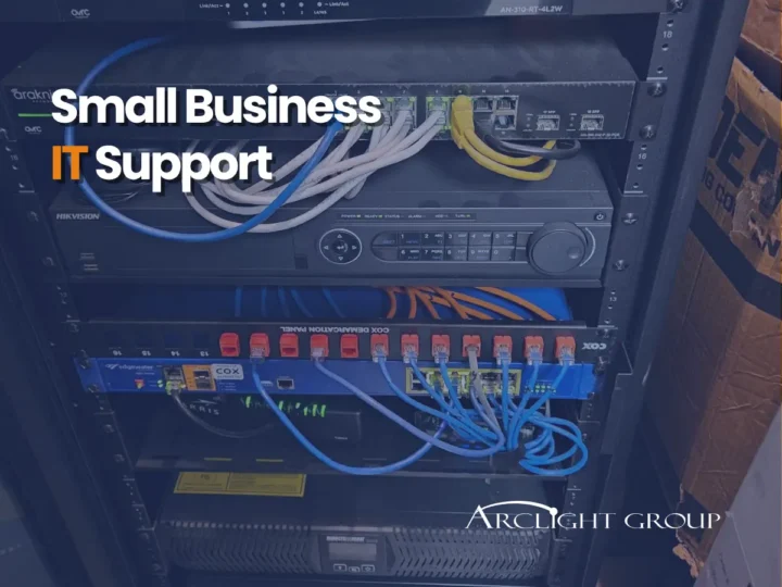 Server rack filled with network hardware and ethernet cables with overlay text reading "Small Business IT Support" and the Arclight Group logo